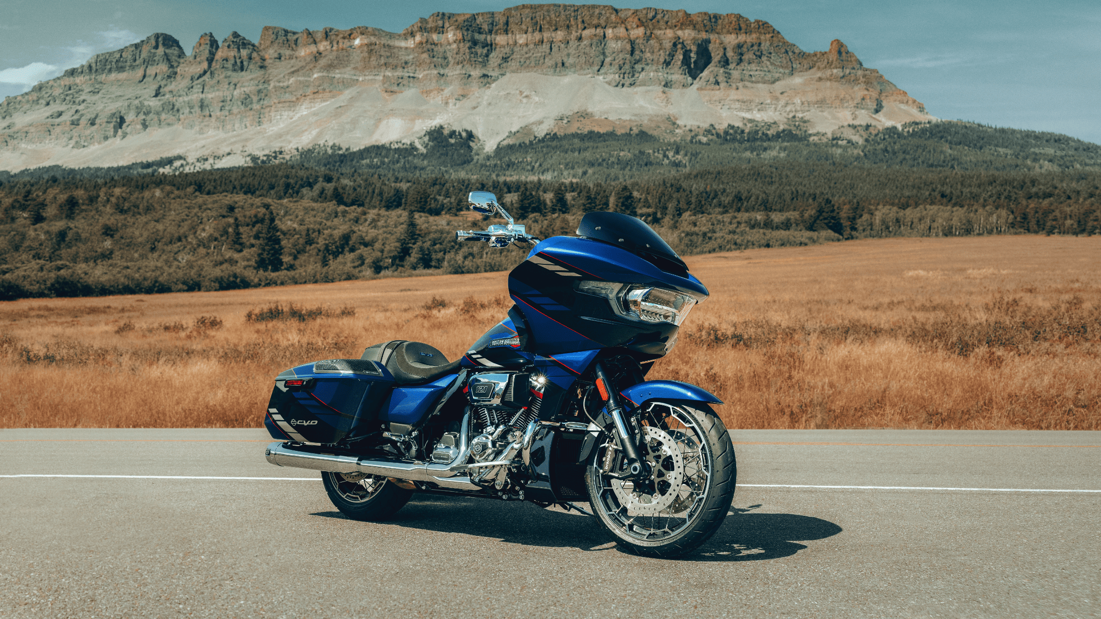 2025 Harley-Davidson® CVO™ Road Glide® in vibrant blue near Stafford, TX with custom detailing and high-performance wheels.