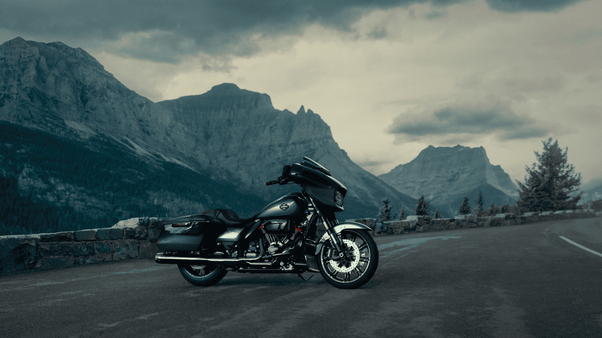 2025 Harley-Davidson® CVO™ Street Glide® in a dramatic mountain setting—merging bold touring attitude & custom detailing for Bellaire, TX streets.