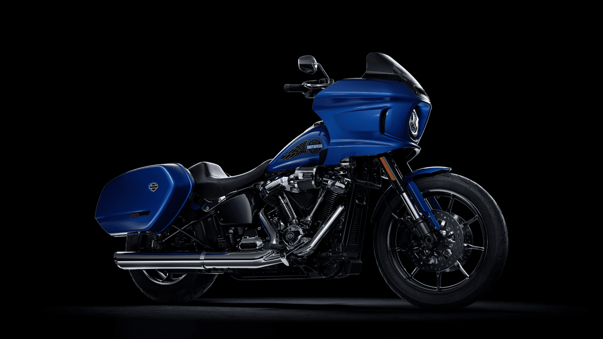 2025 Harley-Davidson® Low Rider® ST in bold blue finish near Missouri City, TX, featuring saddlebags and a performance touring setup.