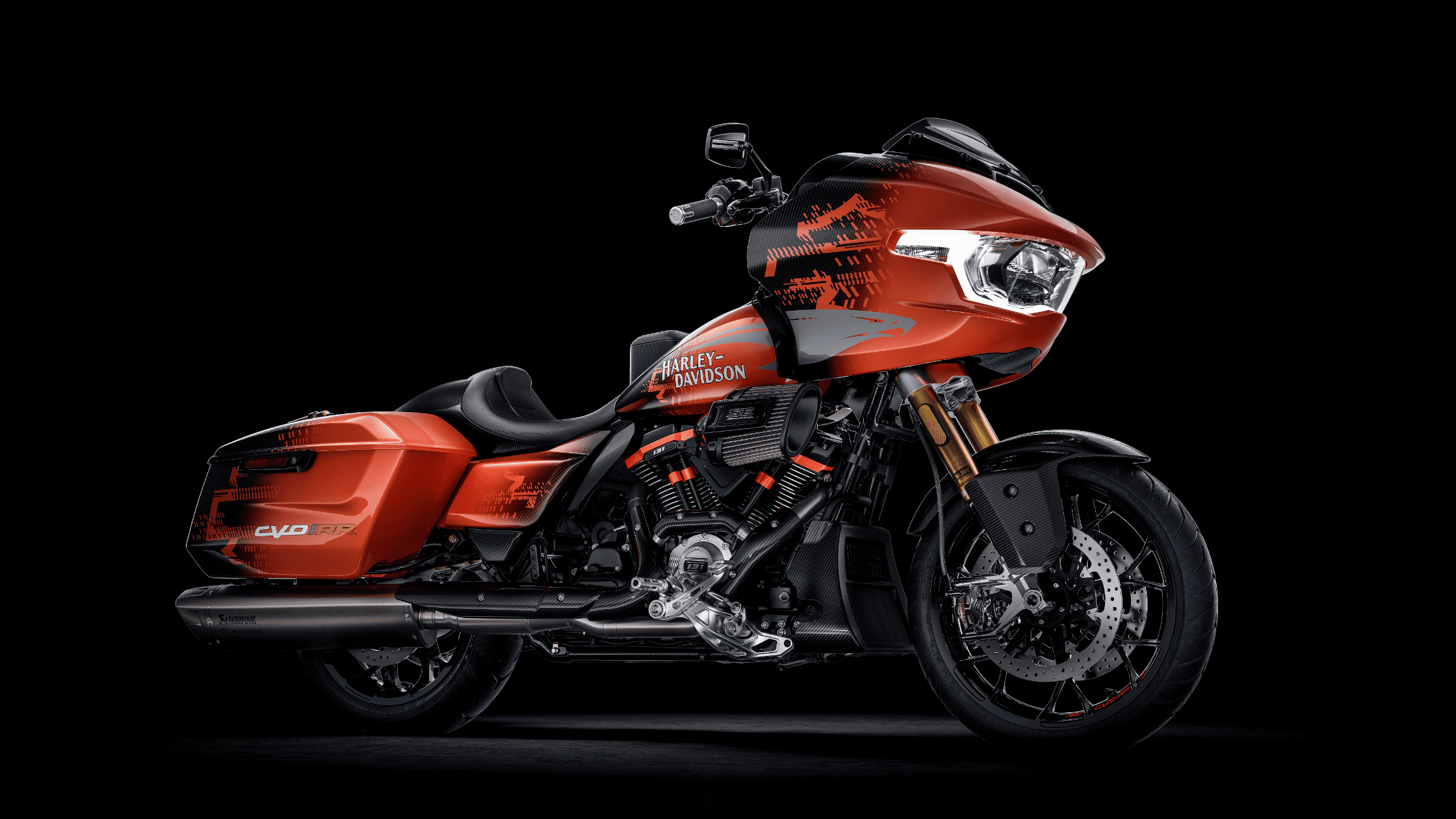 Eye-catching red 2025 Harley-Davidson® CVO™ Road Glide® RR motorcycle showcased on a contrasting black background.
